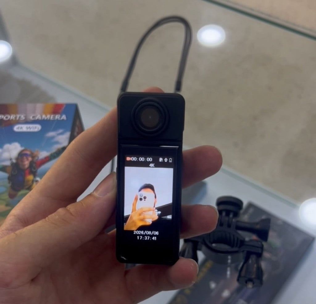 4K sports camera in hand with screen and box — iZone Lebanon