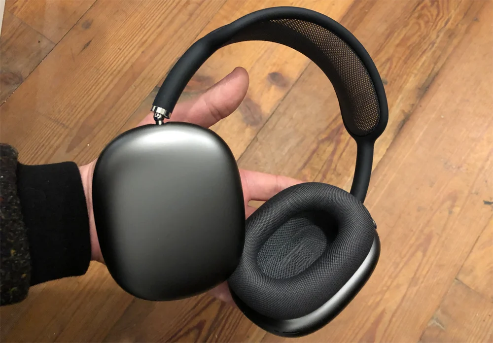 AirPods Max wireless headphones black in hand — iZone Lebanon product photo